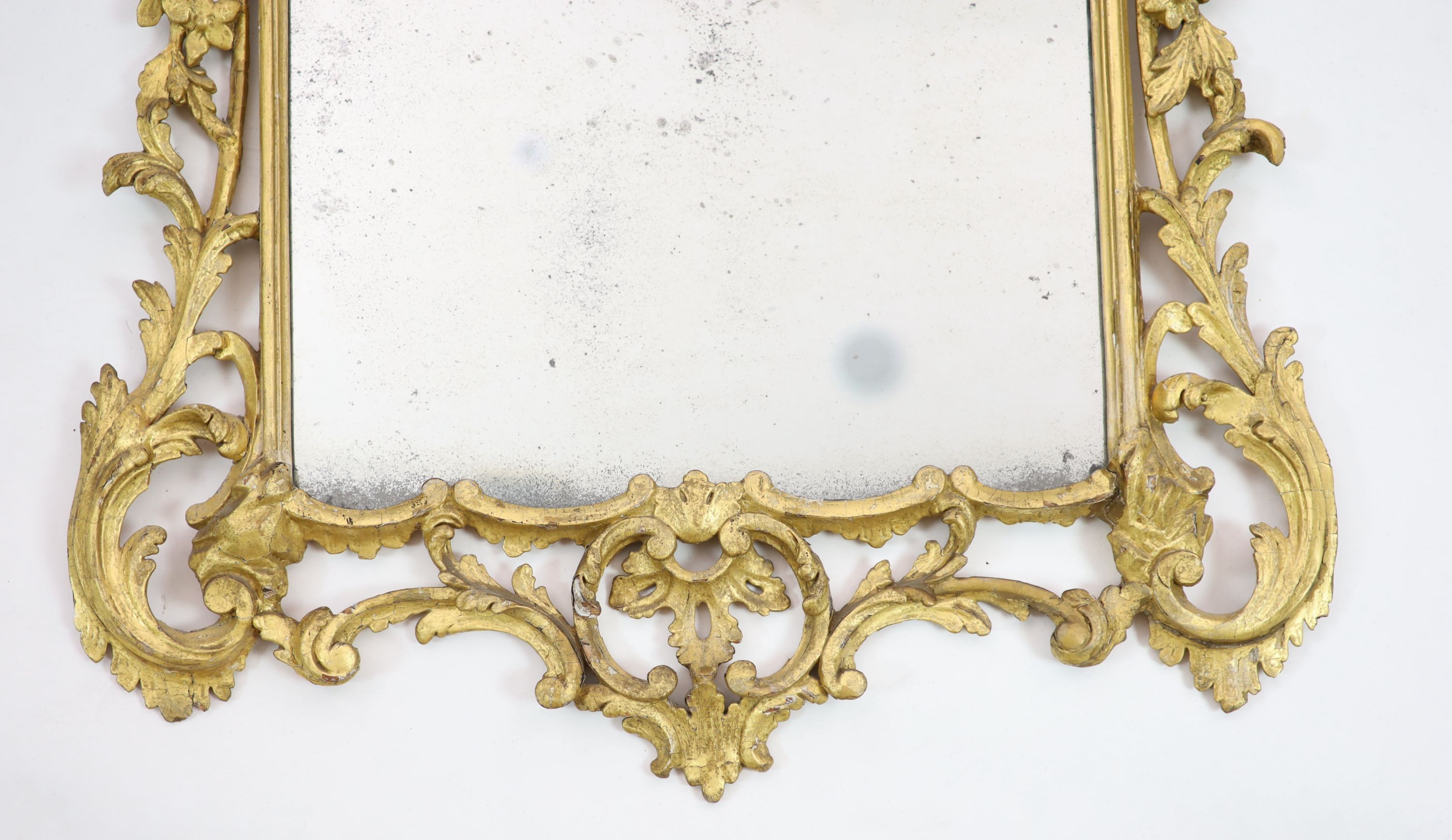 A George III carved giltwood wall mirror, W.74cm H.122cm